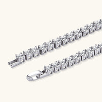 Round moissanite tennis bracelet close-up showing individual prong settings and secure clasp | Olaty