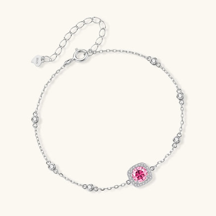 Pink moissanite halo bracelet with bezel set accents in 925 sterling silver angled view | Olaty