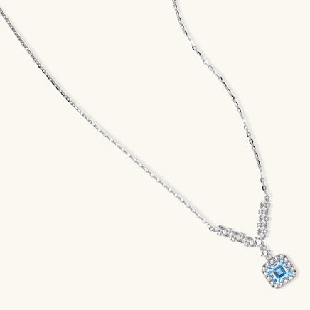 GRA certified blue moissanite diamond celestial arc necklace in 925 sterling silver angled view | Olaty
