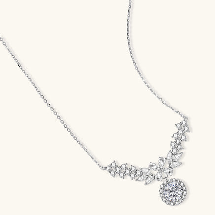 GRA certified moissanite diamond floral halo statement necklace in polished 925 sterling silver, angled view | Olaty