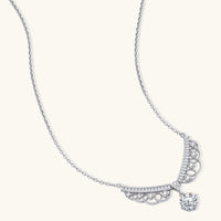Angled view of GRA Certified Moissanite Diamond Angel Wing Necklace with round drop stone | Olaty