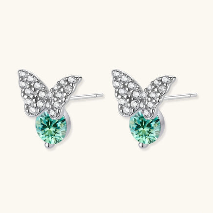 Angled view of Green Moissanite Diamond Butterfly Stud Earrings showing round green stones and butterfly settings | Olaty