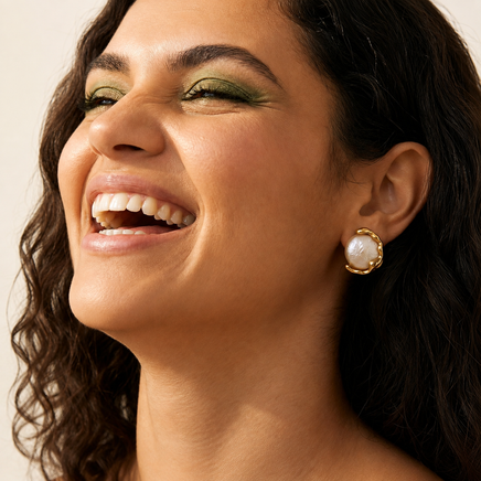 Model wearing freshwater pearl stud earrings | Olaty