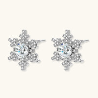Angled view of Moissanite Diamond Winter Spark Snowflake Stud Earrings showing dimensional sterling silver settings | Olaty