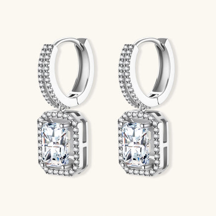 Moissanite emerald cut drop earrings front view with sparkling halo and double row huggie design | Olaty