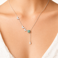 Model wearing Green Moissanite Diamond Butterfly Dreams Lariat Necklace with sparkling butterfly details and elegant drop pendant | Olaty