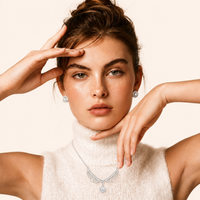 Model wearing GRA Certified Moissanite Diamond Angel Wing Necklace in sterling silver | Olaty