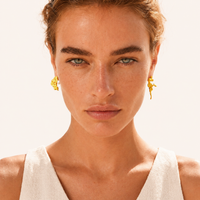 Model wearing Coral Reef Asymmetrical Studs with gold coral texture and freshwater pearl | Olaty