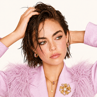 Golden Bow Blossom pearl statement brooch worn on pink blazer with zirconia floral accents | Olaty