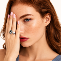 Model wearing Dual Element Zirconia and gray pearl statement ring | Olaty