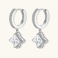 Side angled view of GRA Certified Moissanite Diamond Dangle Huggies showing pavé hoops and drop settings | Olaty