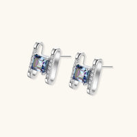 Side angled view of Mystic Moissanite Diamond Prism Square Stud Earrings showing geometric open frames and posts | Olaty
