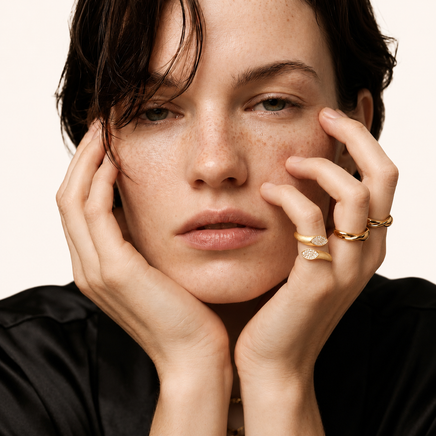 Dual Spark zirconia pavé open ring styled on model with layered gold rings | Olaty
