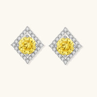 Front view of Yellow Moissanite Golden Halo Stud Earrings with brilliant round center stones and sparkling geometric halos | Olaty