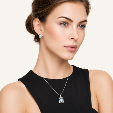 Model styling Prism Dreams Necklace with geometric moissanite pendant, sterling silver chain and matching jewelry | Olaty