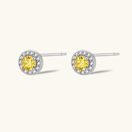 Side view of Yellow Moissanite Diamond Sunburst Halo Stud Earrings showing brilliant halo and posts | Olaty