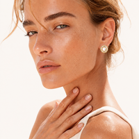 Sunburst freshwater pearl and crystal stud earring styled on model | Olaty