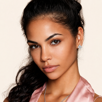 Woman wearing GRA certified moissanite diamond quatrefoil stud earring in polished 925 sterling silver | Olaty