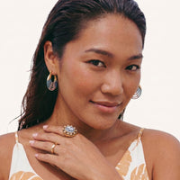 Model wearing Victorian rose cameo statement ring with shell pearl accents | Olaty