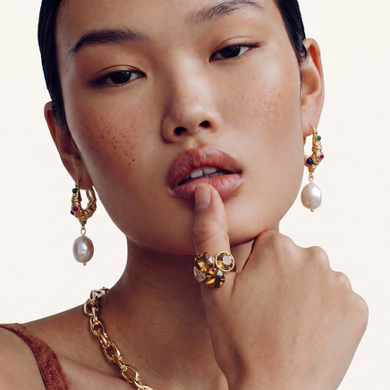 Model wearing sculptural golden-brown zirconia cocktail ring on hand | Olaty