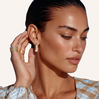 Model styling two-tone lattice crystal statement ring with sparkling zirconia details | Olaty