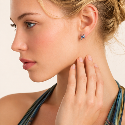 Model wearing Mystic Moissanite Diamond Prism Square Stud Earrings in polished 925 sterling silver | Olaty