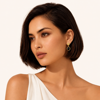 Close-up of model wearing Ripple Drop Agate Earrings in 18K gold-plated sterling silver | Olaty