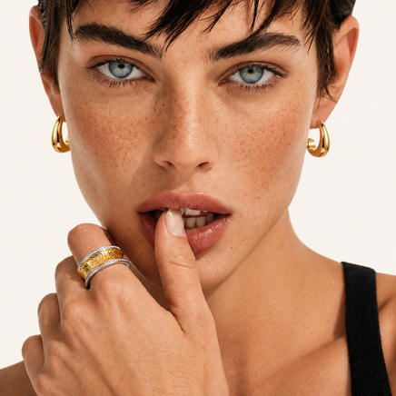 Sculpted Curve Gold Huggie Earrings worn on model close-up | Olaty