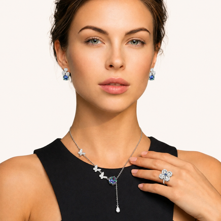 Model wearing GRA Certified Rainbow Moissanite Diamond Lucky Clover Jewelry Set with necklace earrings and ring | Olaty