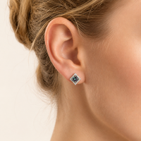 Model wearing Rainbow Moissanite Diamond Prism Dreams Stud Earring in polished sterling silver | Olaty