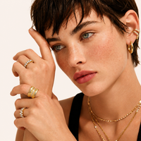 Model wearing Golden Hour Hoops with polished gold finish | Olaty