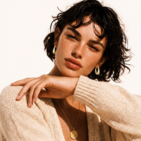 Pavé Crystal gold-plated zirconia hoop earrings styled on model for an elevated everyday look | Olaty