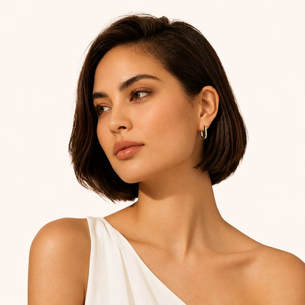 Model wearing Contrast Hoop Earrings with modern black and gold geometric design | Olaty