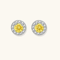 Front view of Yellow Moissanite Diamond Sunburst Halo Stud Earrings with brilliant white stone accents | Olaty