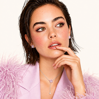 Model wearing pink Zirconia Y necklace and matching geometric Statement Stud Earrings | Olaty