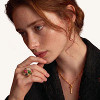 Model wearing rainbow zirconia mosaic dome ring with intricate gold-tone geometric detailing | Olaty