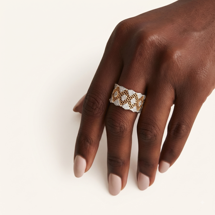 Honeycomb crystal statement ring worn on hand showing gold-tone lattice and zirconia details | Olaty