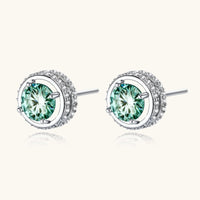 Green Moissanite Diamond Emerald Spark Halo Stud Earrings with polished silver setting and brilliant accents | Olaty