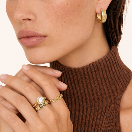 Clover Bloom zirconia hoop earrings in 14K gold-plated eco-brass styled on model | Olaty