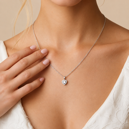 Model wearing GRA Certified Moissanite Diamond Heart Symphony necklace in sterling silver | Olaty