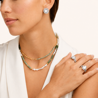 Radiant Pearl Halo stud earrings with geometric crystal halos styled on model | Olaty