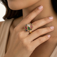 Close-up of multicolor zirconia mosaic statement ring worn on hand | Olaty