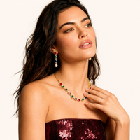 Model wearing multicolor zirconia necklace and matching pearl drop earrings | Olaty
