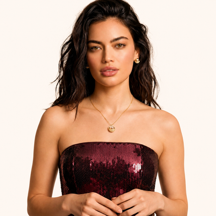 Model wearing solar sphere pendant necklace and matching Statement Stud Earrings | Olaty