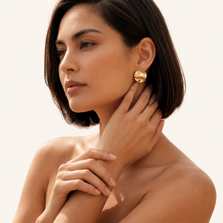 Another model is wearing Flow Sculpted Statement Stud Earrings | Olaty
