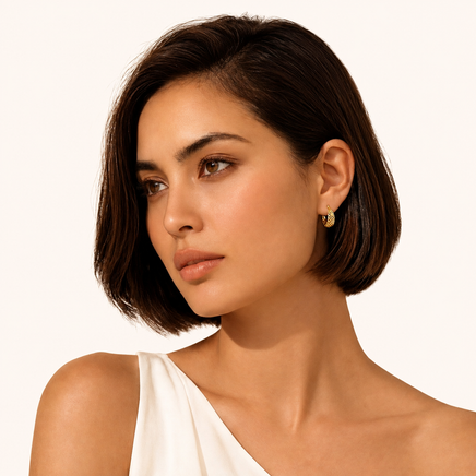 Honeycomb Dream sculptural gold hoop earrings worn on model | Olaty