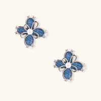 Product video showcasing Denim Pearl Bloom Statement Stud Earrings with denim-inspired floral details, lustrous pearl accents and a bold statement design | Olaty