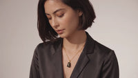 Product video showcasing Forest Gold Amber Necklace with a deep forest-toned pendant, warm amber details and gold-tone chain | Olaty