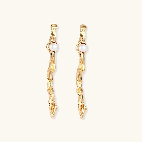 Product video showcasing Molten Pearl Flow Drop Earrings with lustrous pearl drops and fluid molten-inspired sculptural details | Olaty