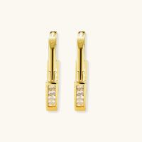 Product video showcasing Golden Hour Geometric Huggie Hoop Earrings with sculptural geometric details and a polished gold-tone huggie hoop design | Olaty
